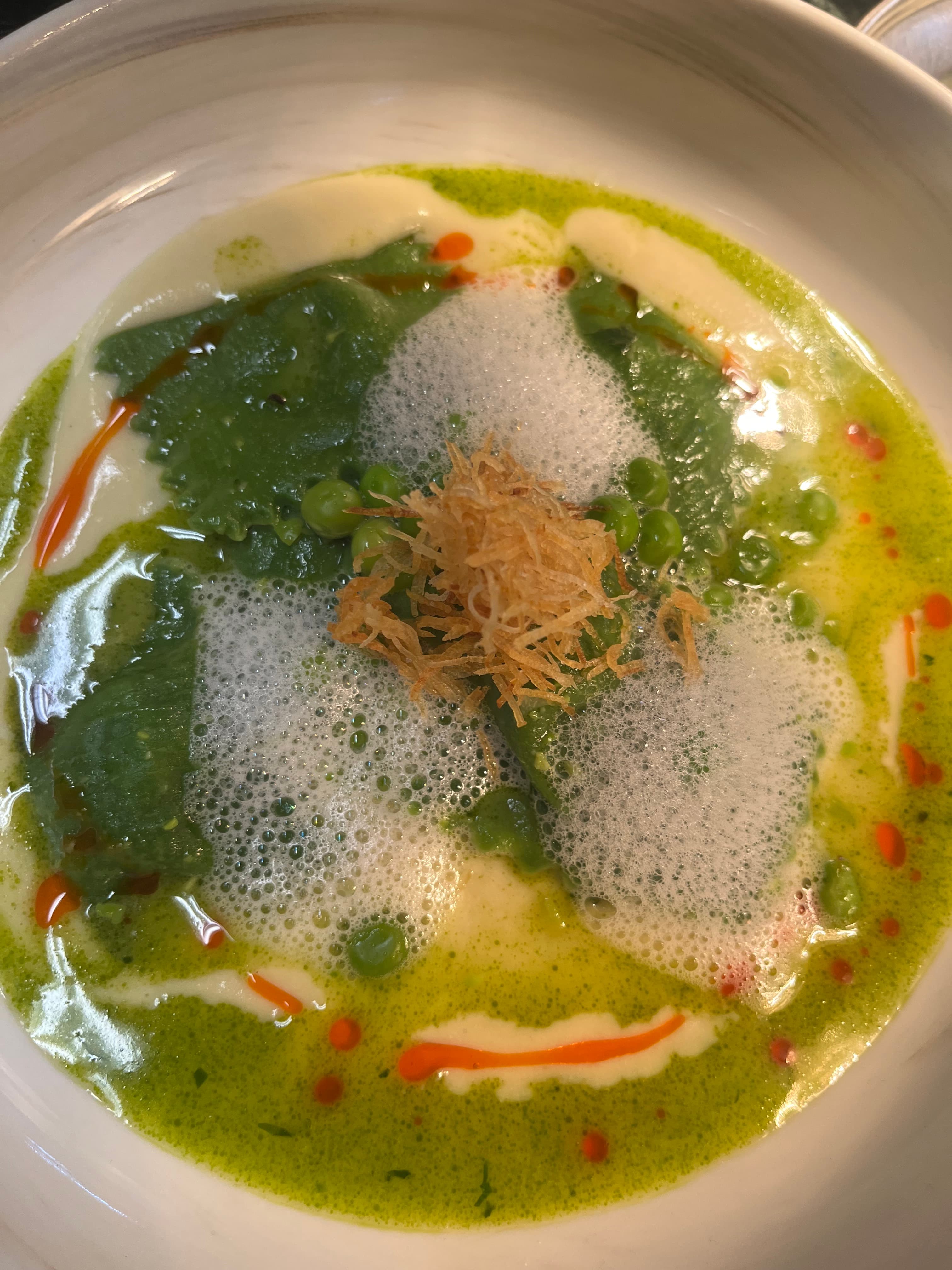 Nimona Agnolotti, Horseradish Roasted Cauliflower Puree, Crispy Potato Skin, Tomato Chilli Dust, Mint Oil